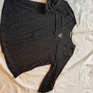 Black top with white polka dots